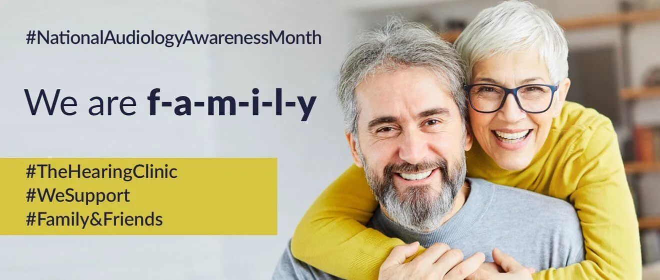 Smiling elderly couple hugging