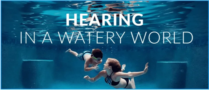Swimmers underwater with text