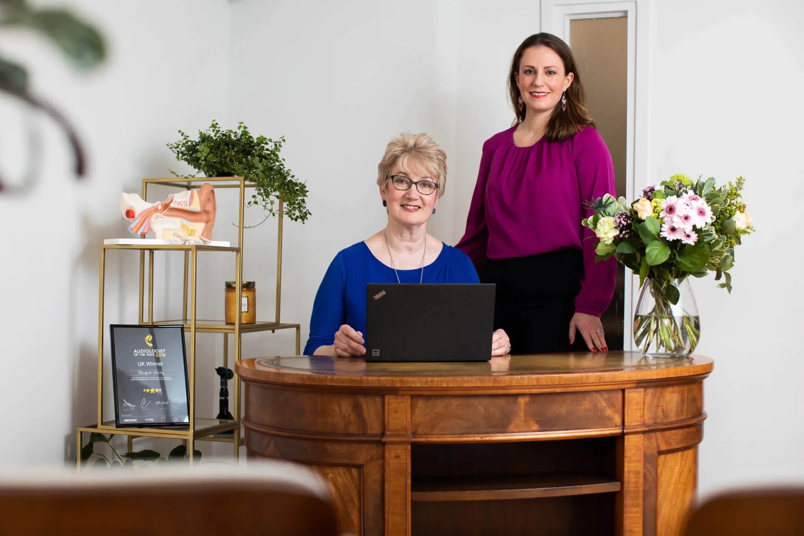 Two women in office.