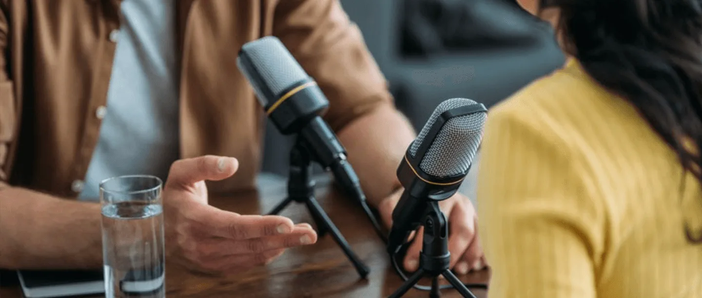 Two people podcasting conversation.