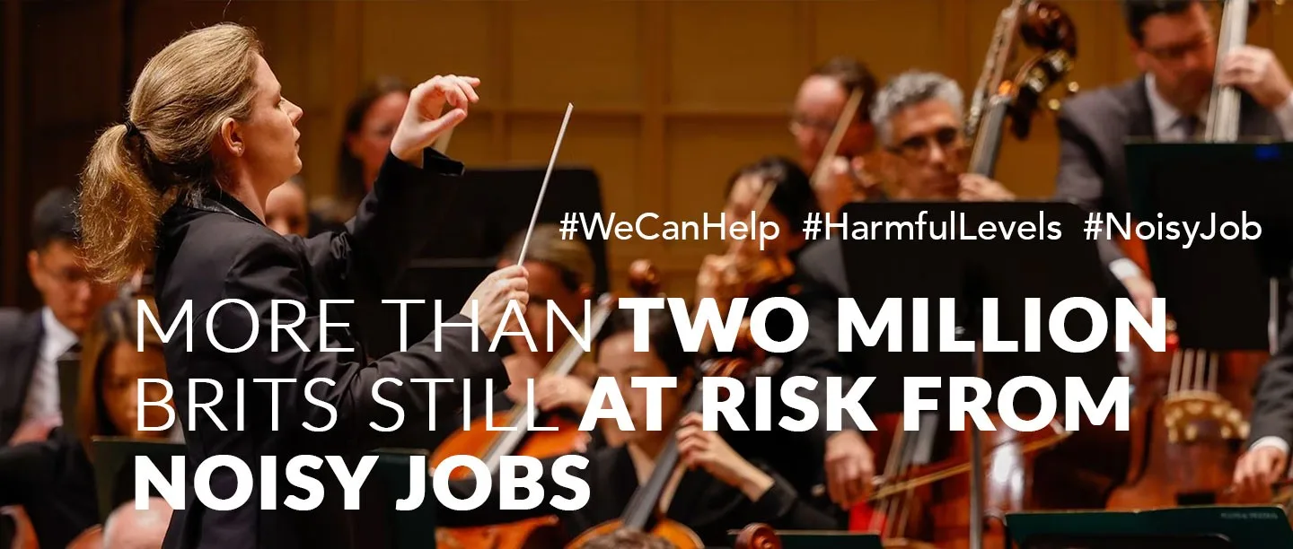 Conductor leading an orchestra