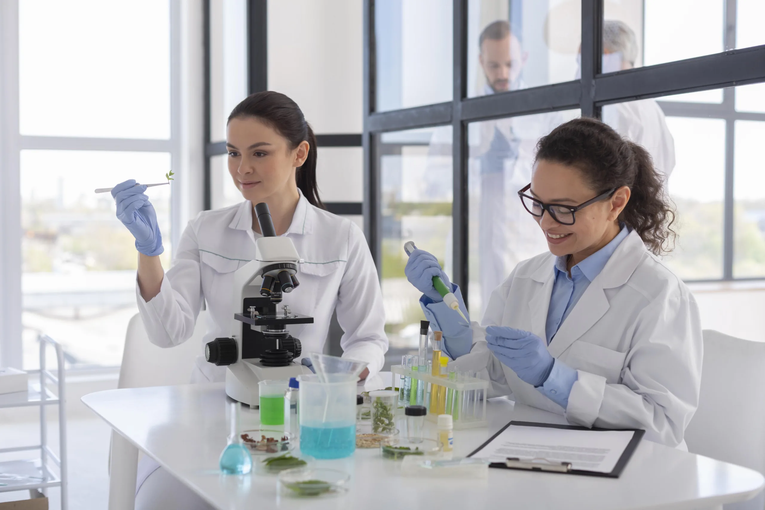 Scientists conducting lab experiments