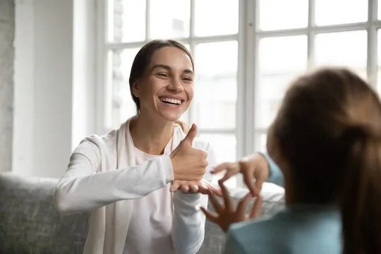 People using sign language.