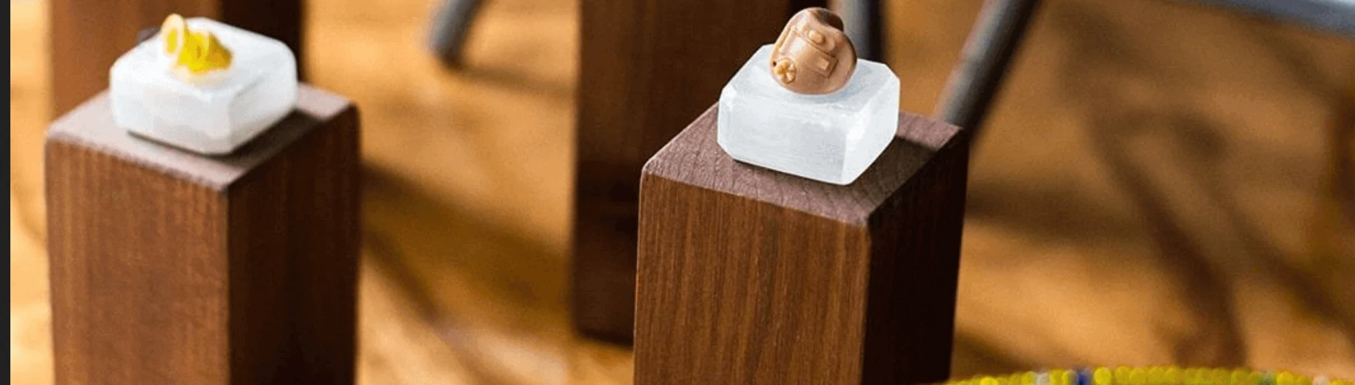 Hearing aids on wooden blocks