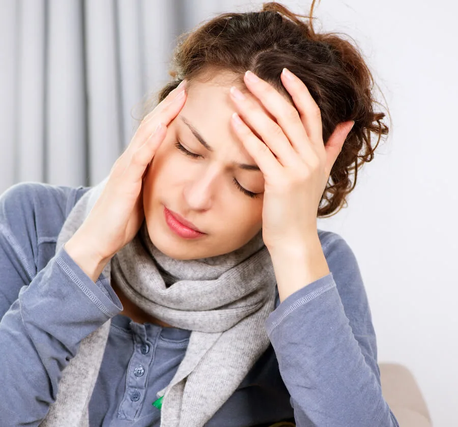 Woman with headache pain.