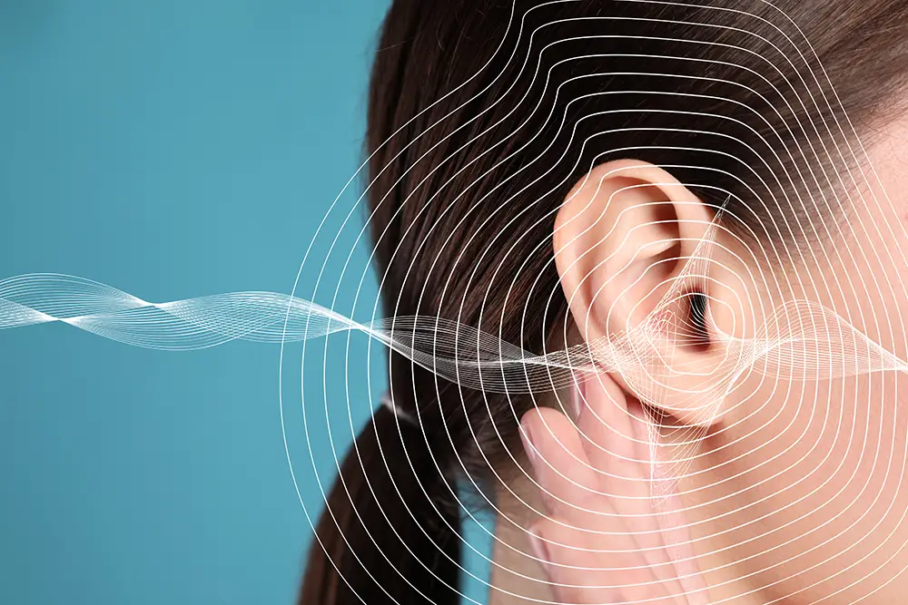 Ear with sound waves.