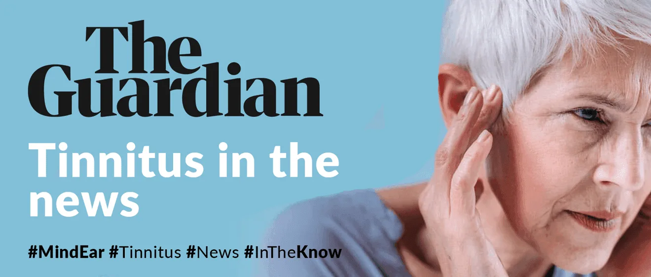 Elderly woman touching ear.