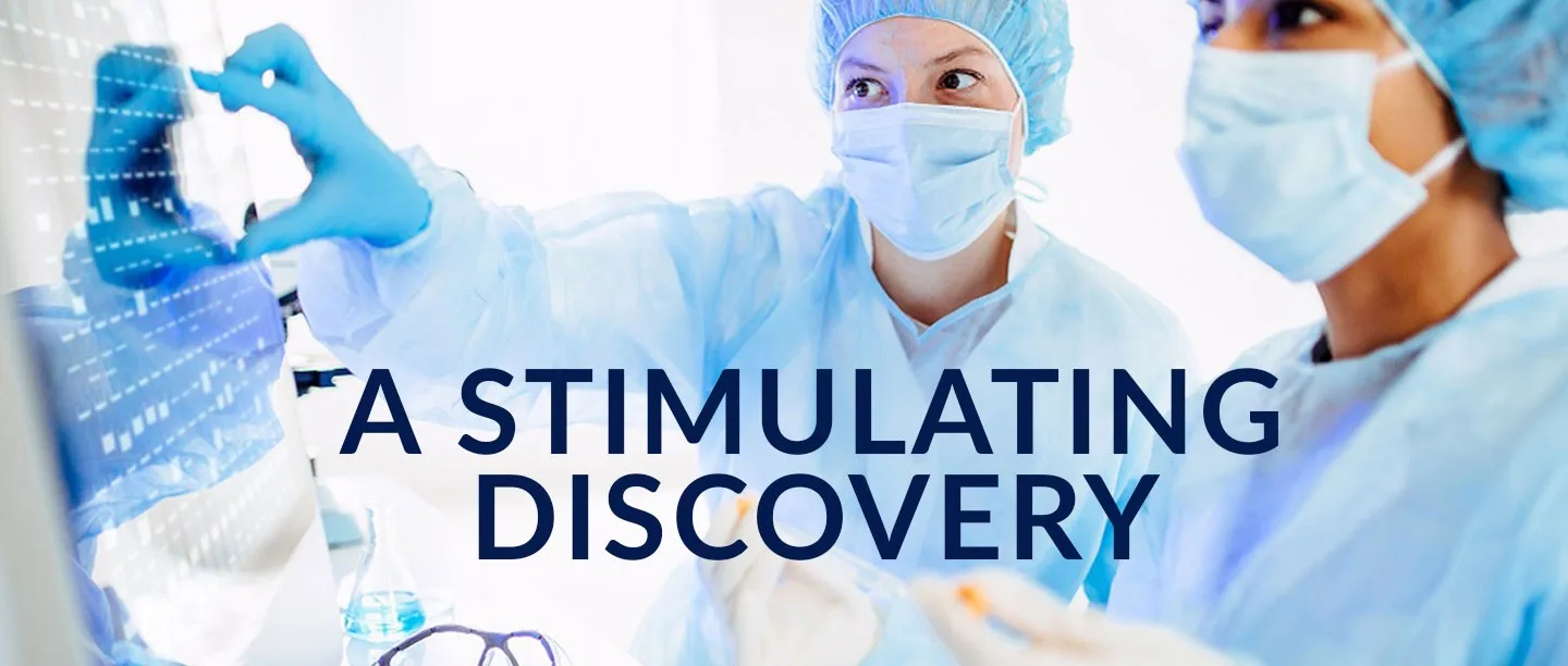 Scientists in blue attire