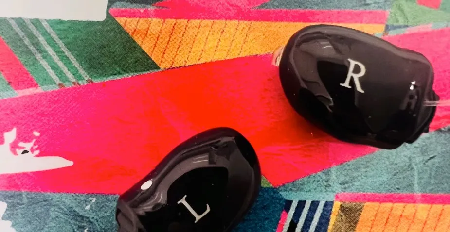 Black left and right hearing aids